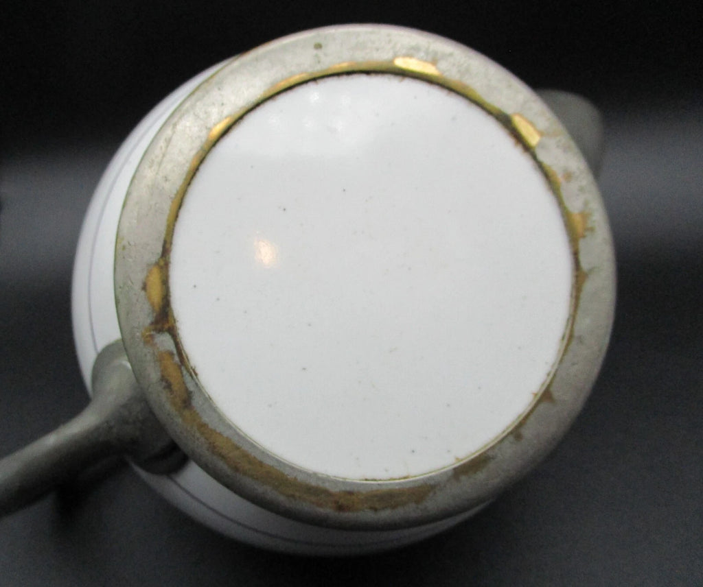 Graniteware enamel pewter teapot purple floral design Manning, Bowman Co.